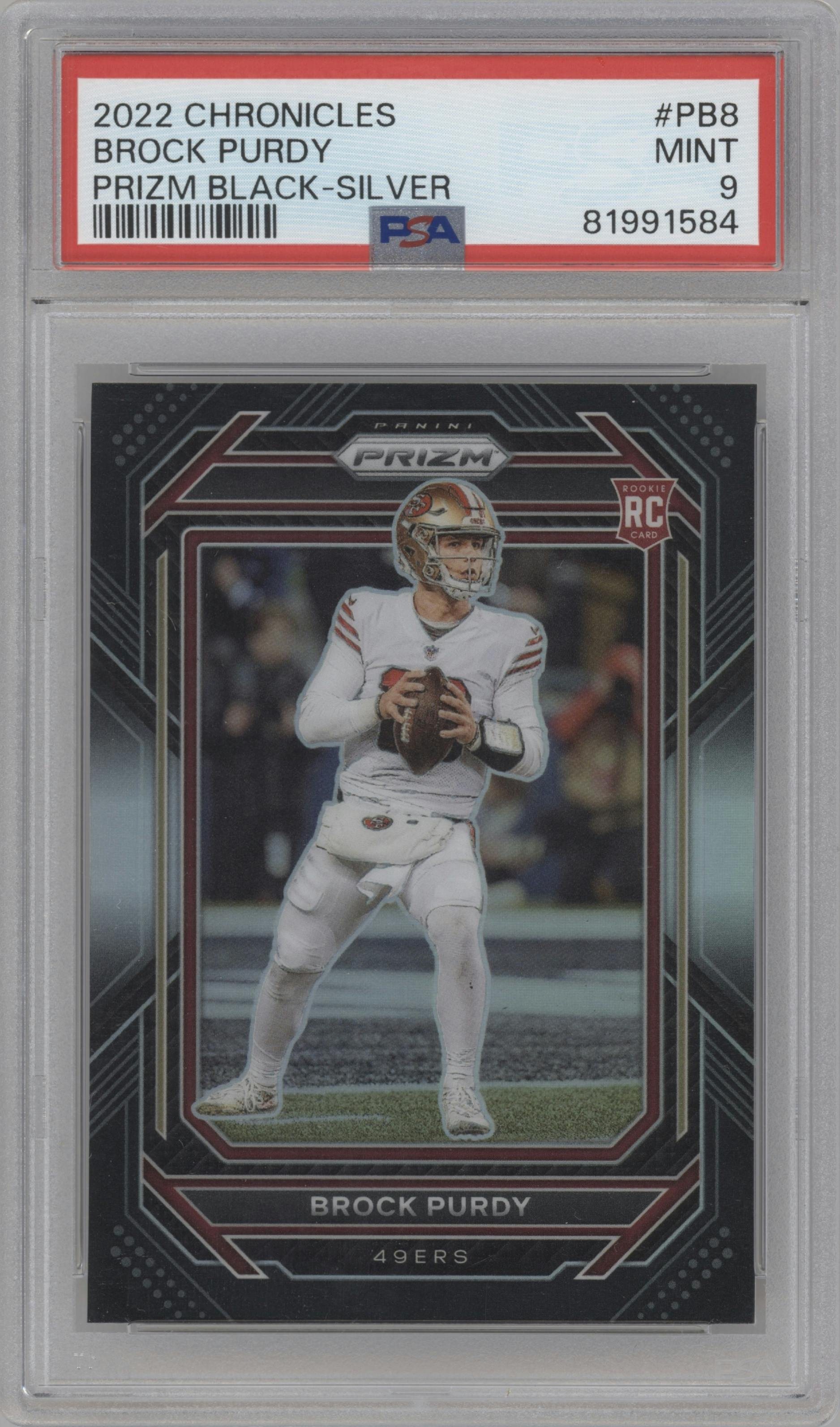 Brock Purdy from the 2022 Panini Chronicles set featuring a Silver parallel graded by PSA and given an overall grade of 9.