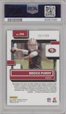 Brock Purdy from the 2022 Panini Donruss set featuring a Season Stat Line parallel graded by PSA and given an overall grade of 10.