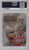 Michael Jordan from the 1996-97 Fleer Metal  set graded by PSA and given an overall grade of 8.