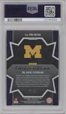Blake Corum from the 2024 Panini Prizm Draft Picks set featuring a Blue Ice parallel graded by PSA and given an overall grade of 10.