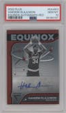 Hakeem Olajuwon from the 2022-23 Panini Flux set featuring a Red parallel graded by PSA and given an overall grade of 10.