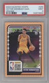 Victor Wembanyama from the 2023-24 Panini Haunted Hoops set featuring a Orange parallel graded by PSA and given an overall grade of 9.