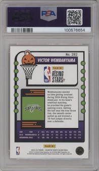 Victor Wembanyama from the 2023-24 Panini Haunted Hoops set featuring a Orange parallel graded by PSA and given an overall grade of 9.
