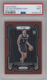 Victor Wembanyama from the 2023-24 Panini Prizm set featuring a Red Prizm parallel graded by PSA and given an overall grade of 9.