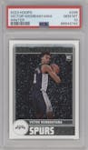 Victor Wembanyama from the 2023-24 Panini NBA Hoops set featuring a Winter parallel graded by PSA and given an overall grade of 10.