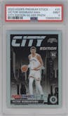 Victor Wembanyama from the 2023-24 Panini Hoops Premium Stock set featuring a Silver Prizm parallel graded by PSA and given an overall grade of 9.