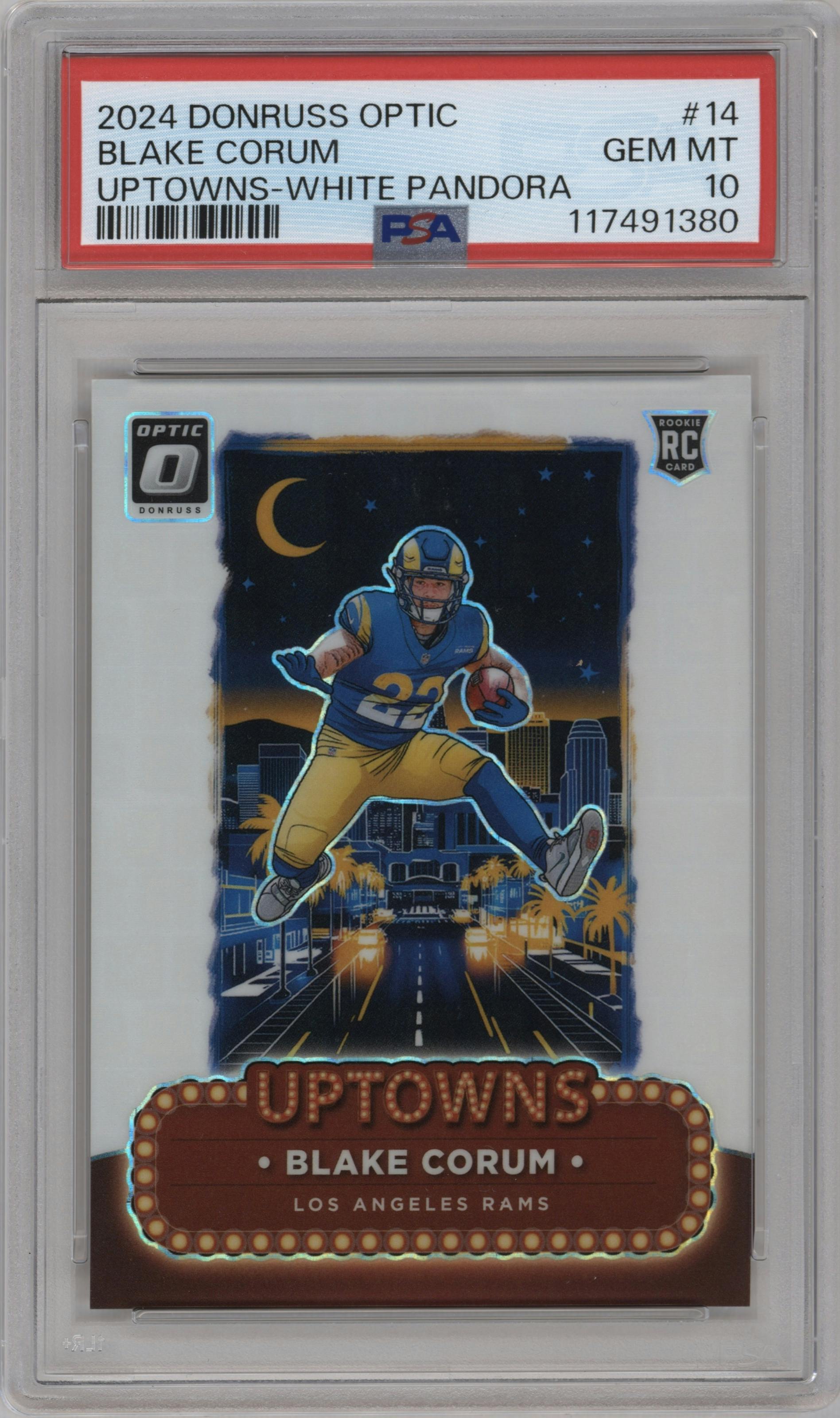 Blake Corum from the 2024 Donruss Optic set featuring a White Pandora parallel graded by PSA and given an overall grade of 10.