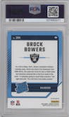 Brock Bowers from the 2024 Donruss set featuring a Red Pandora parallel graded by PSA and given an overall grade of 10.