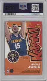 Nikola Jokic from the 2024-25 Panini Revolution set featuring a Gold parallel graded by PSA and given an overall grade of 9.