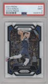 Luka Doncic from the 2023-24 Panini Prizm set featuring a White Prizm parallel graded by PSA and given an overall grade of 9.