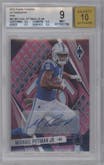 Michael Pittman Jr. from the 2023 Panini Phoenix set featuring a Pink parallel graded by Beckett and given an overall grade of 9.