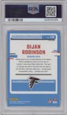 Bijan Robinson from the 2023 Donruss Optic set featuring a Red Mojo  parallel graded by PSA and given an overall grade of 10.