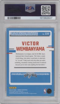 Victor Wembanyama from the 2023-24 Panini Donruss set featuring a Red parallel graded by PSA and given an overall grade of 9.