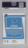 Amon-Ra St. Brown from the 2021 Panini Donruss set featuring a Press Proof Blue parallel graded by PSA and given an overall grade of 9.