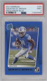 Amon-Ra St. Brown from the 2021 Panini Donruss set featuring a Press Proof Blue parallel graded by PSA and given an overall grade of 9.