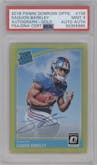 Saquon Barkley from the 2018 Panini Donruss Optic set featuring a Gold parallel graded by PSA and given an overall grade of 9.
