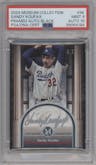 Sandy Koufax from the 2024 Topps Museum Collection set featuring a Black parallel graded by PSA and given an overall grade of 9.