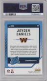 Jayden Daniels from the 2024 Donruss set featuring a Red Wave parallel graded by PSA and given an overall grade of 9.