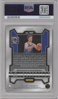 Brandin Podziemski from the 2023-24 Panini Prizm set featuring a Snakeskin parallel graded by PSA and given an overall grade of 9.