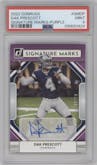 Dak Prescott from the 2022 Panini Donruss set featuring a Purple parallel graded by PSA and given an overall grade of 9.