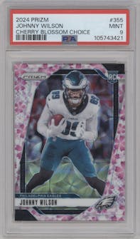 Johnny Wilson from the 2024 Panini Prizm set featuring a Choice Cherry Blossom Prizm parallel graded by PSA and given an overall grade of 9.