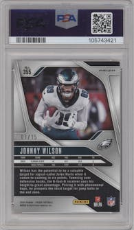 Johnny Wilson from the 2024 Panini Prizm set featuring a Choice Cherry Blossom Prizm parallel graded by PSA and given an overall grade of 9.
