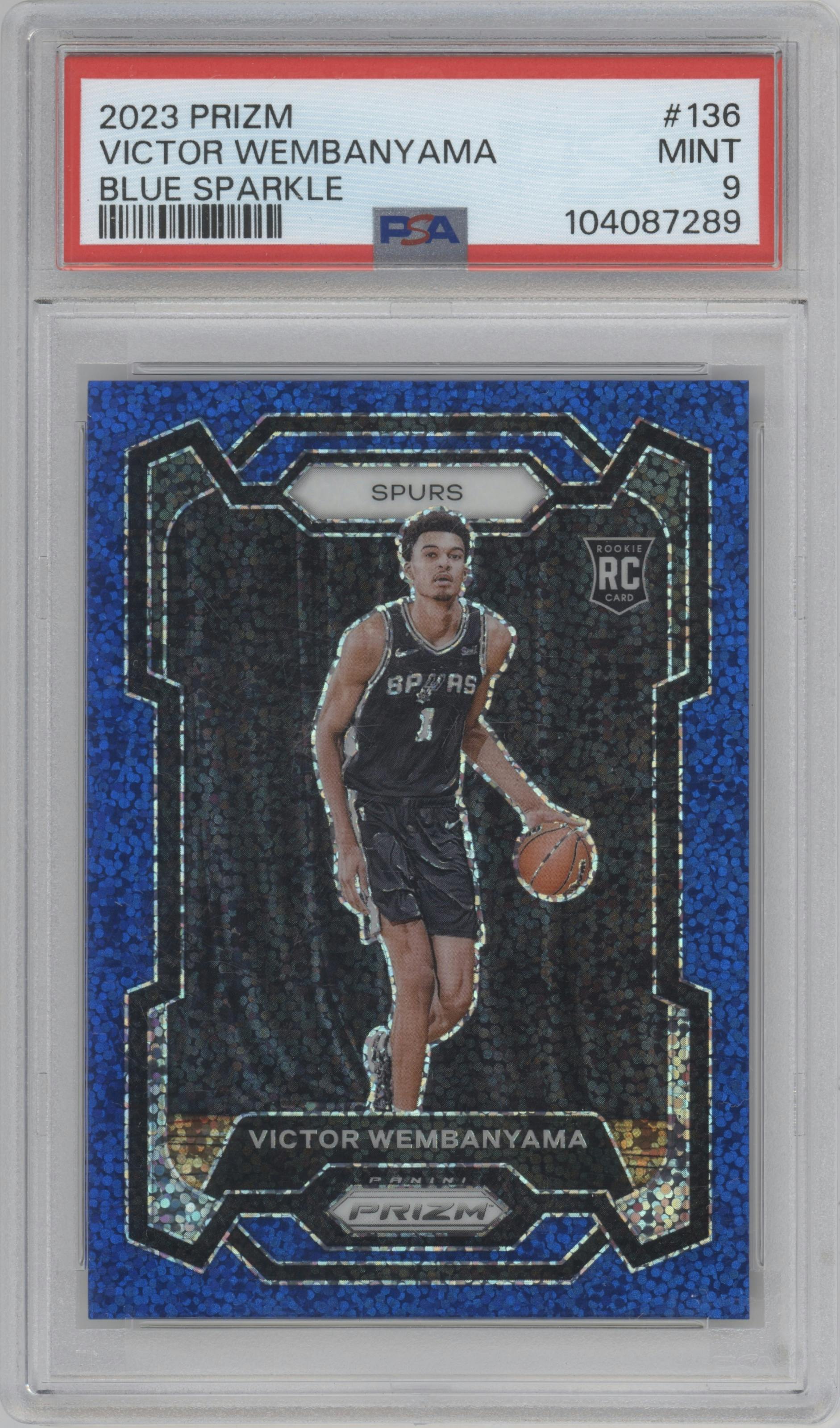 Victor Wembanyama from the 2023-24 Panini Prizm set featuring a Blue Sparkle parallel graded by PSA and given an overall grade of 9.