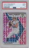 Justin Herbert from the 2020 Panini Mosaic set featuring a Pink Camo parallel graded by PSA and given an overall grade of 9.