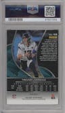 Trevor Lawrence from the 2022 Panini Spectra set featuring a Neon Splatter parallel graded by PSA and given an overall grade of 9.