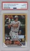 Adley Rutschman from the 2023 Topps 1st Edition set featuring a Gold Foil parallel graded by PSA and given an overall grade of 10.
