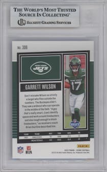 Garrett Wilson from the 2022 Panini Score set featuring a Blue Showcase parallel graded by Beckett and given an overall grade of 9.