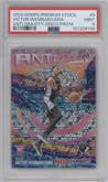 Victor Wembanyama from the 2023-24 Panini Hoops Premium Stock set featuring a Disco Prizm parallel graded by PSA and given an overall grade of 9.