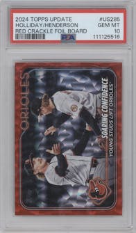 Gunnar Henderson/Jackson Holliday from the 2024 Topps Update set featuring a Red Crackle Foilboard parallel graded by PSA and given an overall grade of 10.