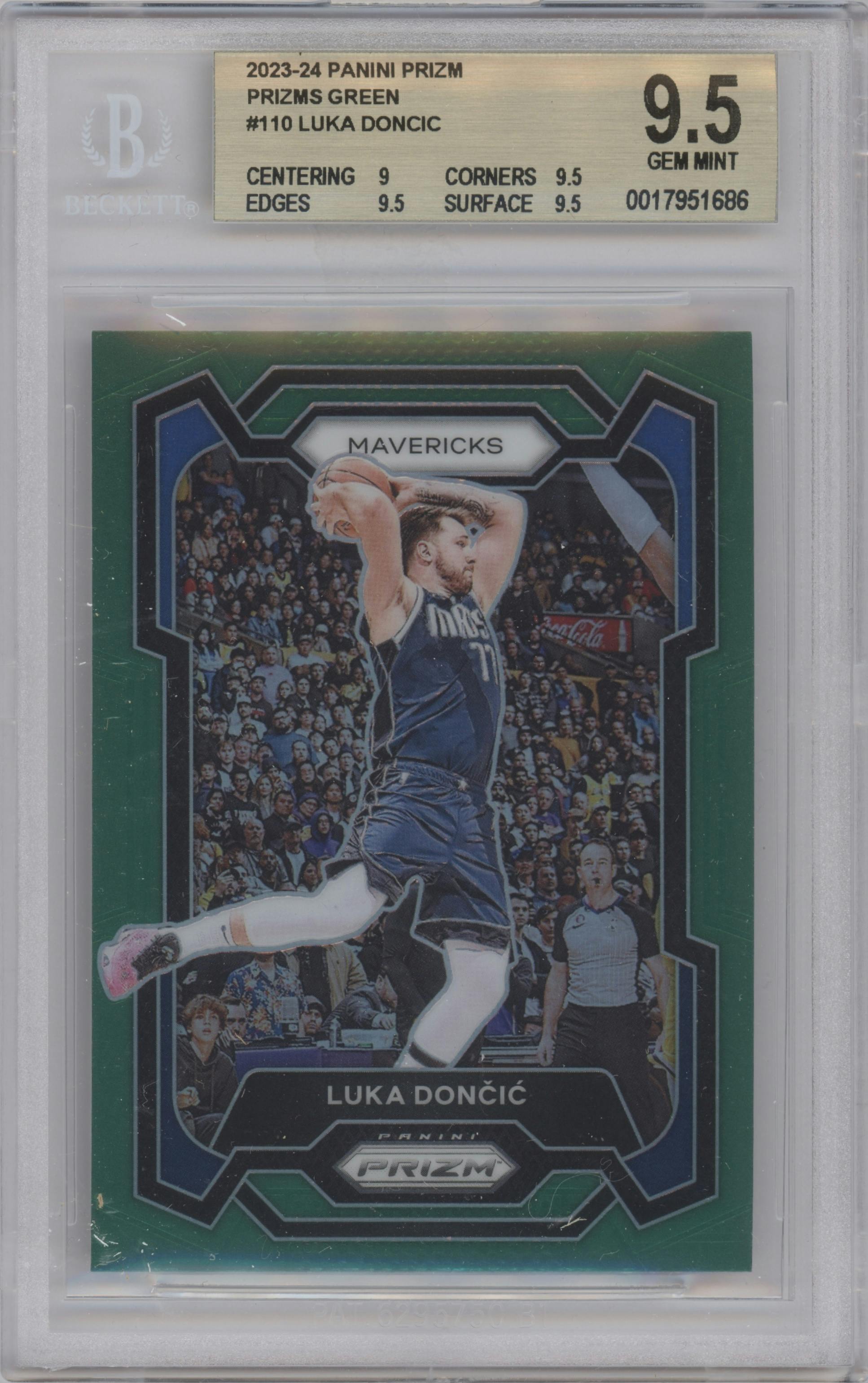 Luka Doncic from the 2023-24 Panini Prizm set featuring a Green Prizm parallel graded by Beckett and given an overall grade of 9.5.