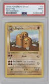 Dugtrio from the 1999 Pokemon set graded by PSA and given an overall grade of 9.