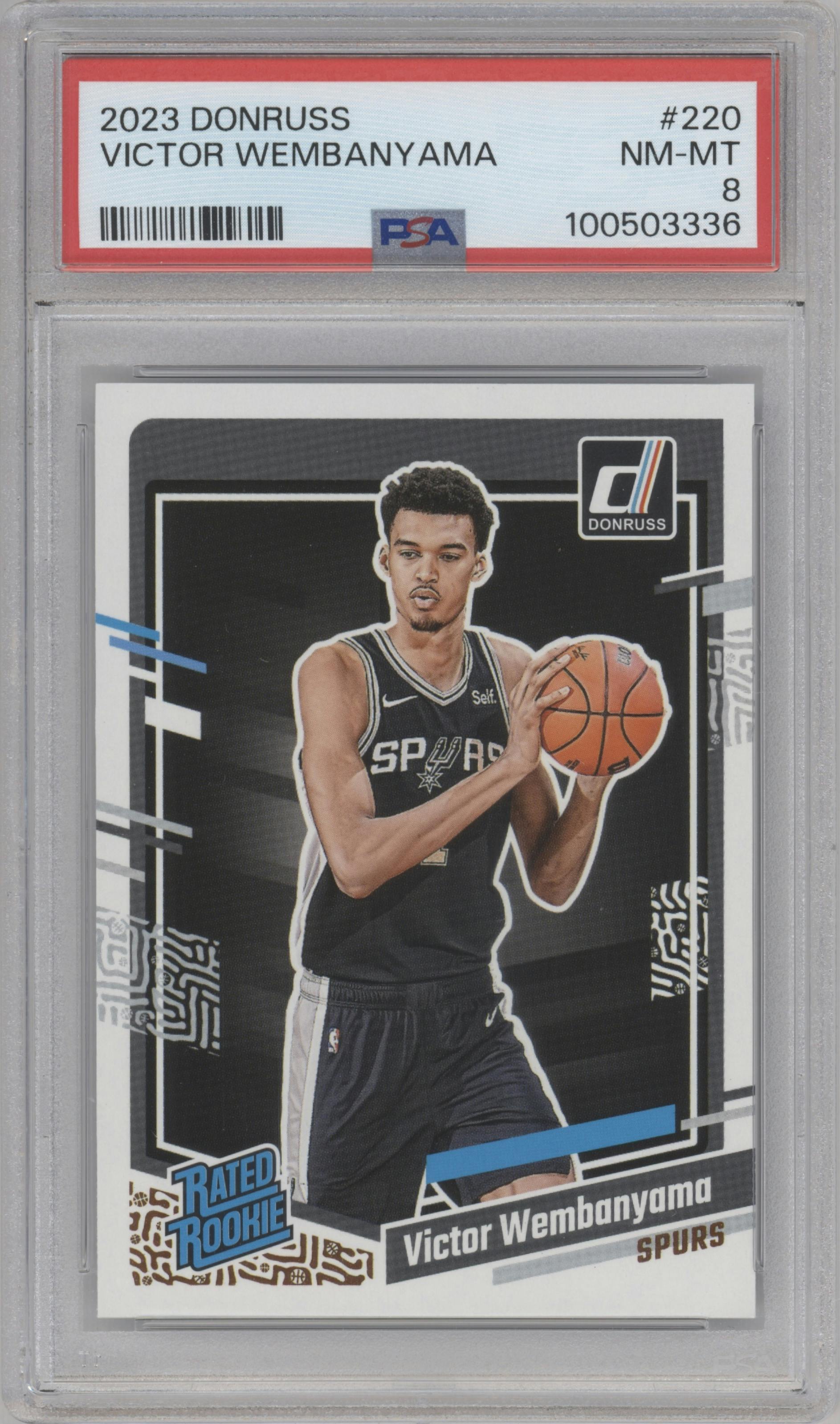 Victor Wembanyama from the 2023-24 Panini Donruss set graded by PSA and given an overall grade of 8.