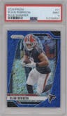 Bijan Robinson from the 2024 Panini Prizm set featuring a Blue Shimmer parallel graded by PSA and given an overall grade of 9.