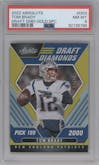 Tom Brady  from the 2022 Panini Absolute set featuring a Gold Spectrum  parallel graded by PSA and given an overall grade of 8.