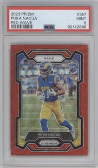 Puka Nacua from the 2023 Panini Prizm set featuring a Red Wave parallel graded by PSA and given an overall grade of 9.