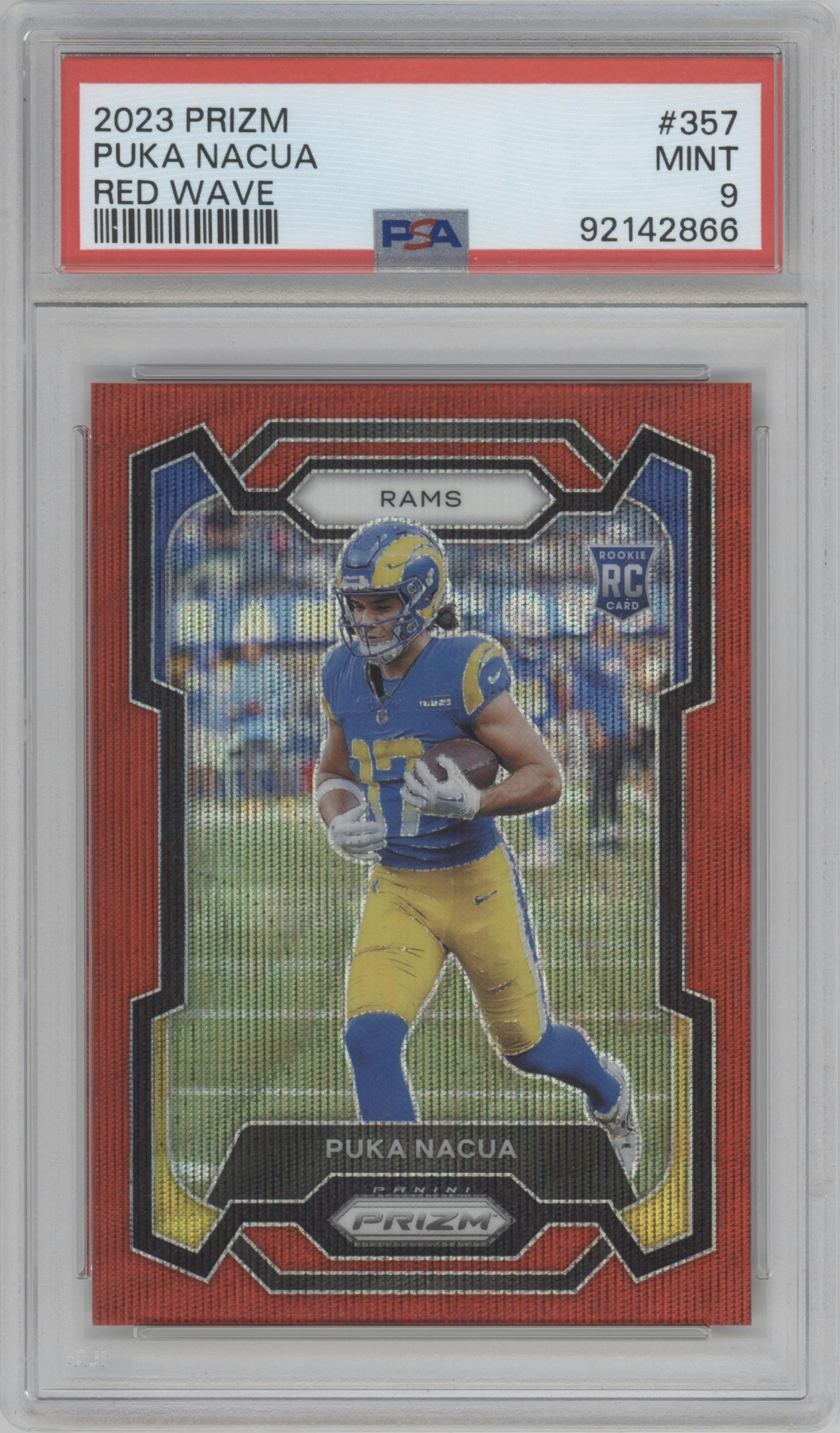 Puka Nacua from the 2023 Panini Prizm set featuring a Red Wave parallel graded by PSA and given an overall grade of 9.