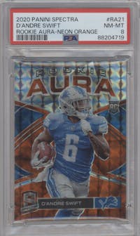 D'Andre Swift from the 2020 Panini Spectra set featuring a Neon Orange parallel graded by PSA and given an overall grade of 8.