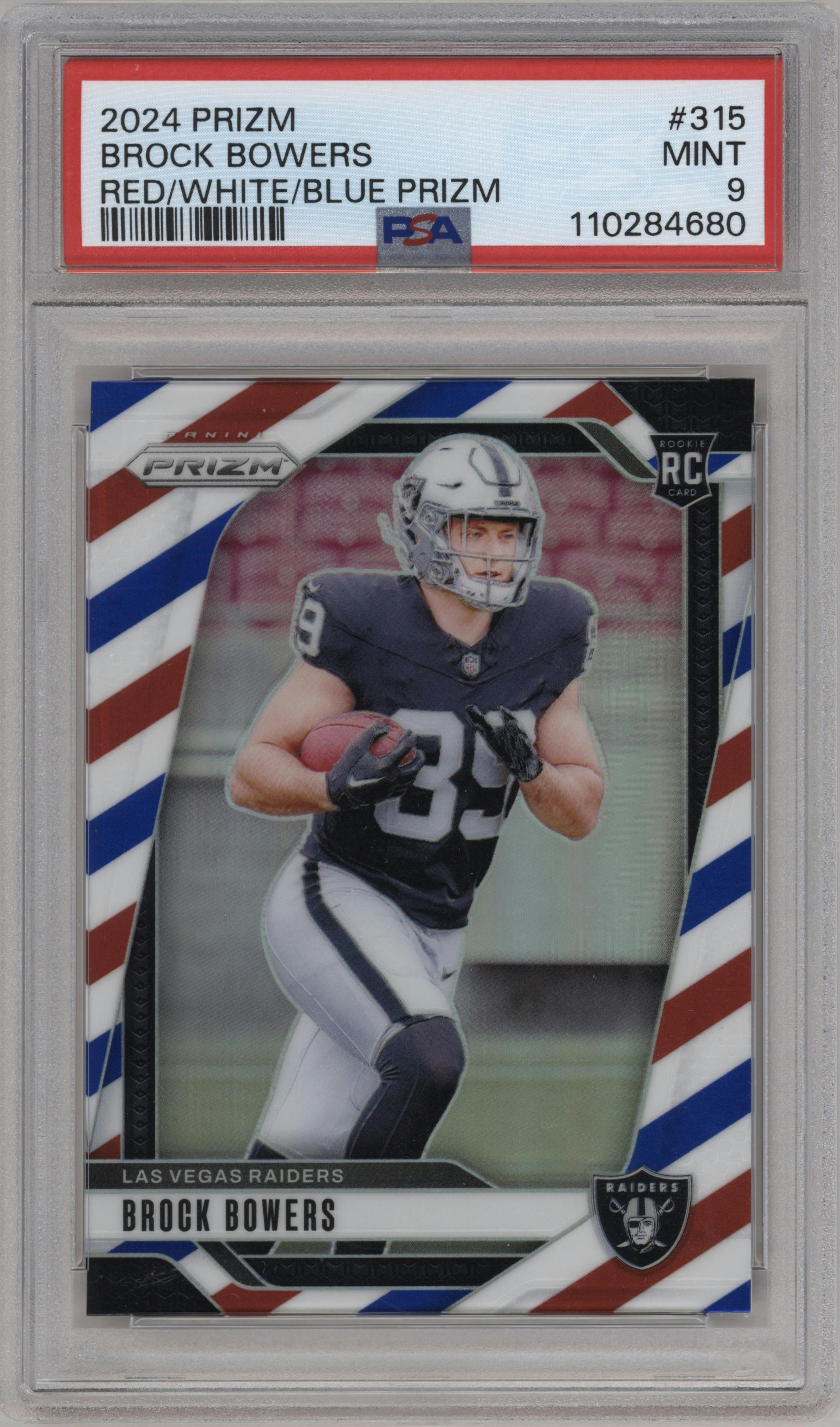 Brock Bowers from the 2024 Panini Prizm set featuring a Red White Blue Prizm parallel graded by PSA and given an overall grade of 9.