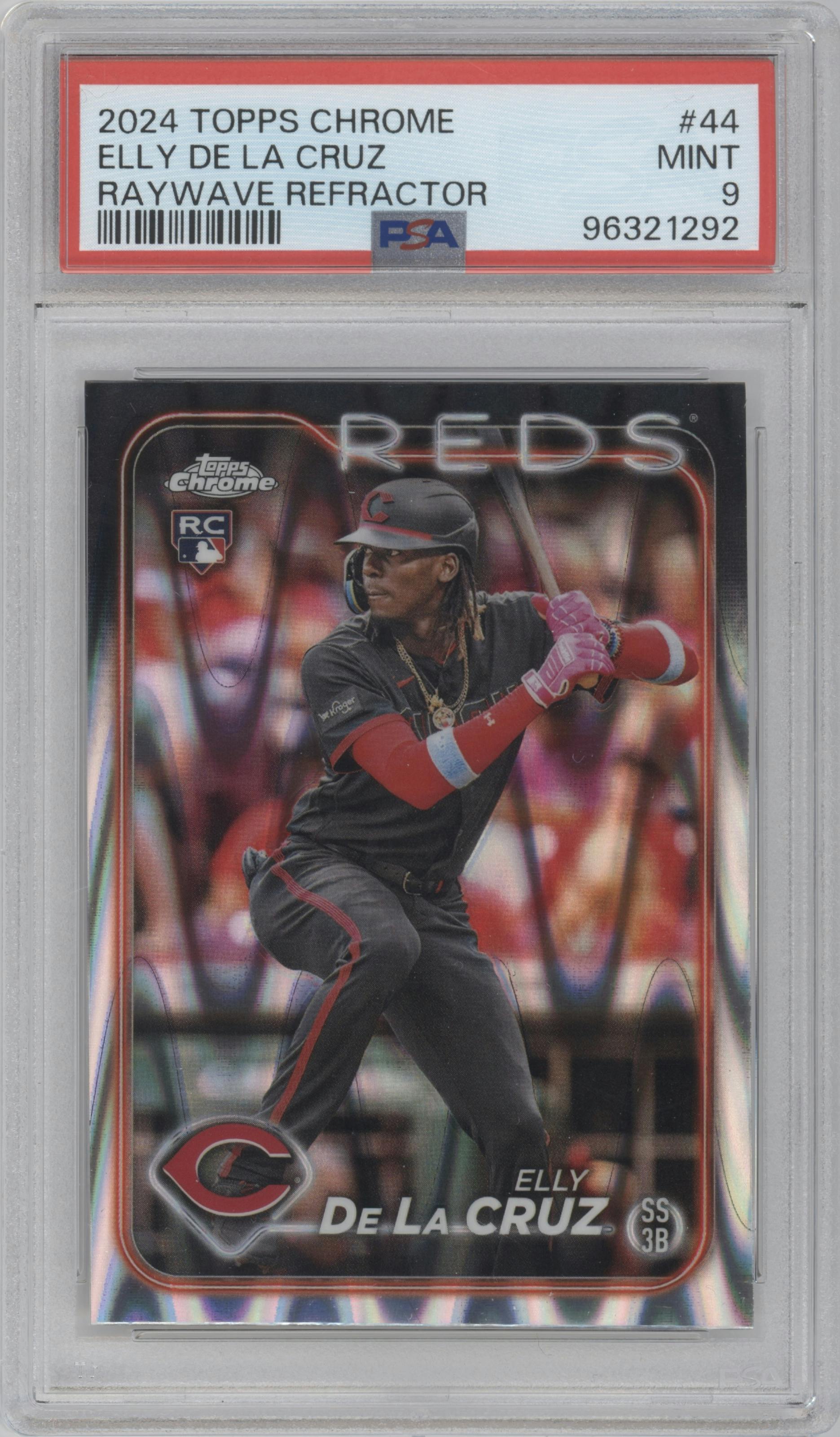 Elly De La Cruz from the 2024 Topps Chrome set featuring a Raywave Refractor parallel graded by PSA and given an overall grade of 9.