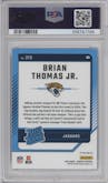 Brian Thomas Jr. from the 2024 Donruss set featuring a Red Pandora parallel graded by PSA and given an overall grade of 10.