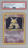 Alakazam from the 2000 Pokemon set graded by PSA and given an overall grade of 7.