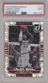LeBron James  from the 2014-15 Panini Donruss  set featuring a Swirlorama parallel graded by PSA and given an overall grade of 9.