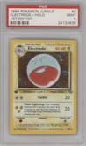 Electrode from the 1999 Pokemon set graded by PSA and given an overall grade of 9.