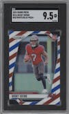 Bucky Irving from the 2024 Panini Prizm set featuring a Red White Blue Prizm parallel graded by SGC and given an overall grade of 9.5.