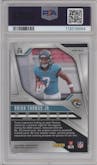 Brian Thomas Jr. from the 2024 Panini Prizm set featuring a No Huddle Blue Prizm parallel graded by PSA and given an overall grade of 9.
