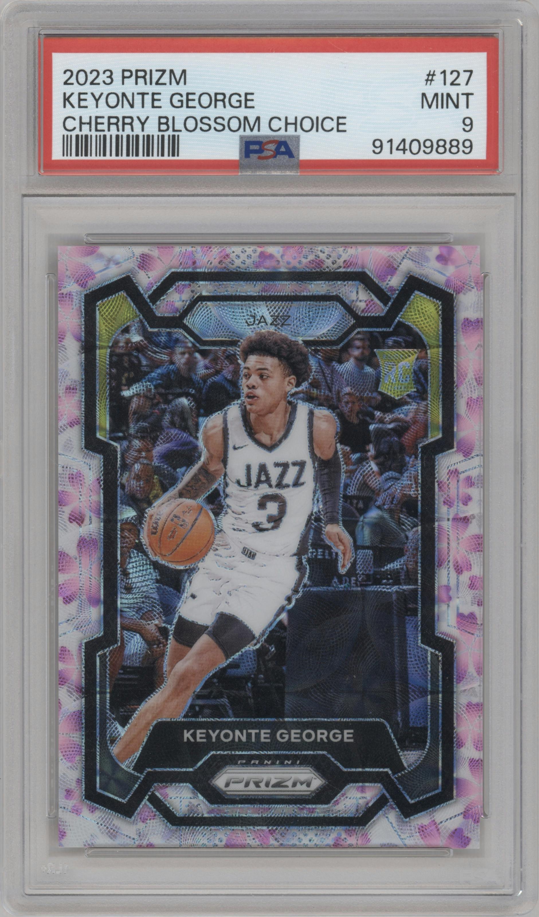 Keyonte George from the 2023-24 Panini Prizm set featuring a Choice Cherry Blossom parallel graded by PSA and given an overall grade of 9.